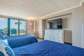 Great 1st floor unit that looks right out onto the beach with direct access
